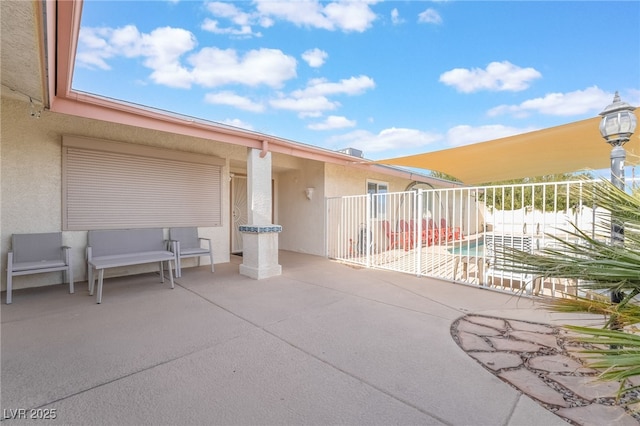 view of patio with a balcony