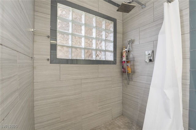 bathroom featuring curtained shower