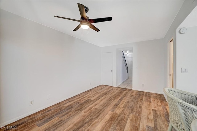 interior space with light hardwood / wood-style floors and ceiling fan