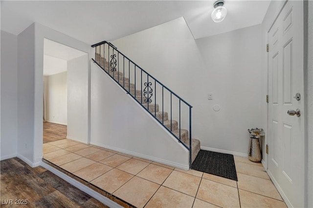 entrance foyer featuring light tile patterned floors