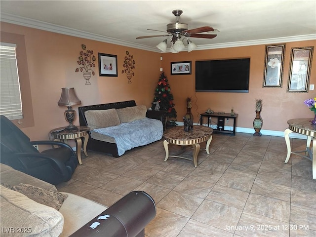 living room featuring ceiling fan and crown molding