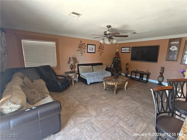 living room with ceiling fan and crown molding