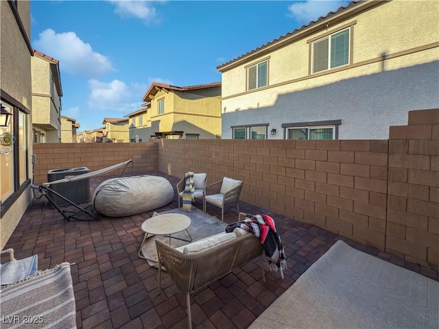 view of patio / terrace with cooling unit