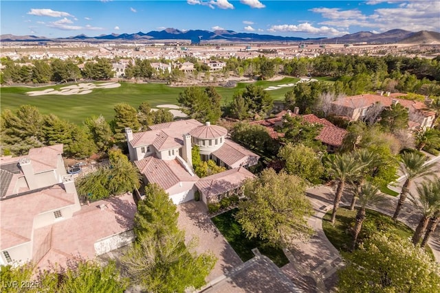 birds eye view of property featuring a mountain view