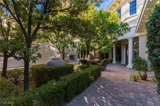 view of home's community with a patio