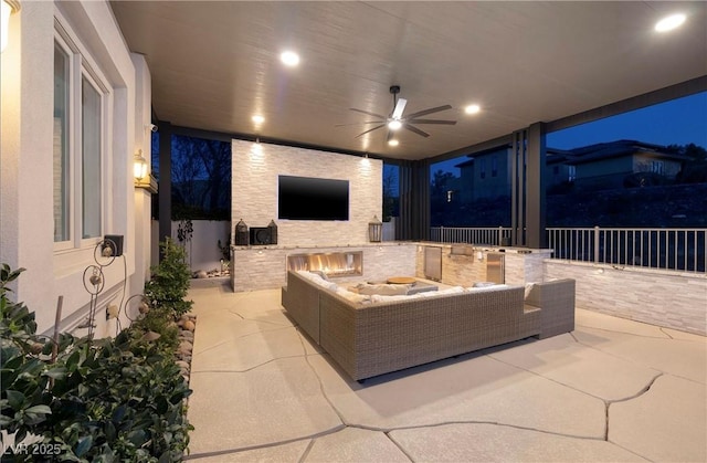 view of patio with ceiling fan