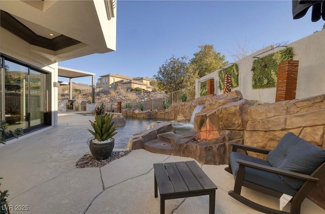 view of patio / terrace featuring a water view