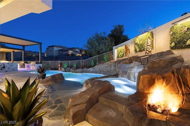 view of swimming pool featuring pool water feature