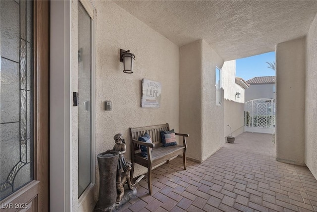 view of patio / terrace featuring a gate