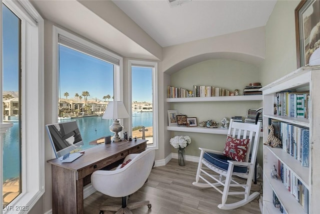 office featuring light wood finished floors and baseboards