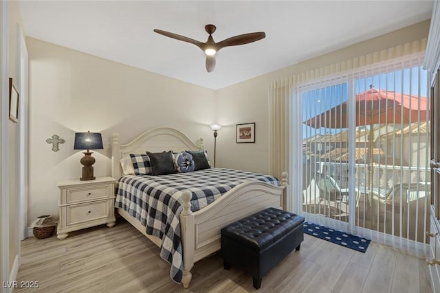 bedroom with access to outside, a ceiling fan, and light wood-style floors