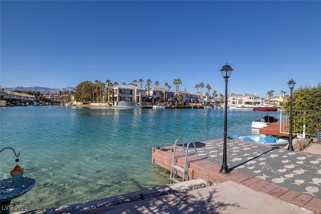 property view of water with a boat dock