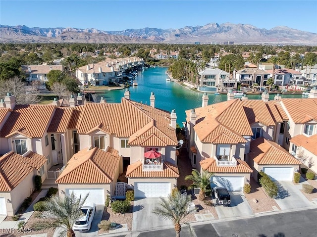 aerial view with a residential view and a mountain view