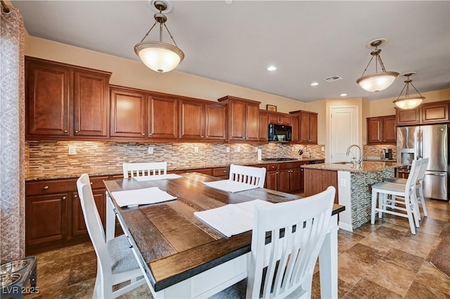 dining area with sink