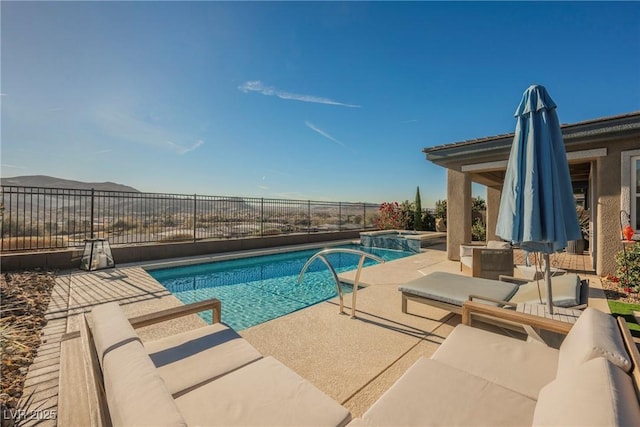 view of pool featuring an in ground hot tub, outdoor lounge area, and a patio