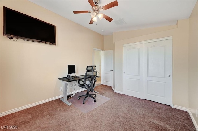 office space featuring ceiling fan, carpet, and vaulted ceiling