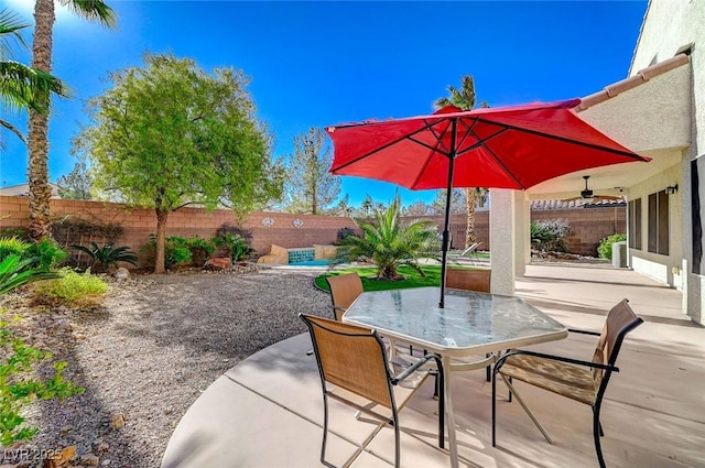 view of patio with ceiling fan