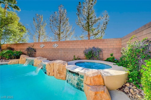 view of pool featuring an in ground hot tub and pool water feature