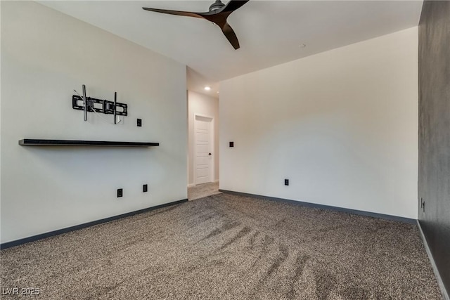 unfurnished living room featuring carpet and ceiling fan