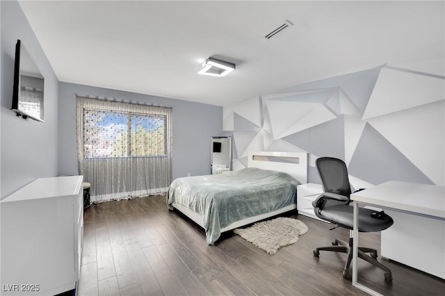 bedroom featuring dark hardwood / wood-style flooring