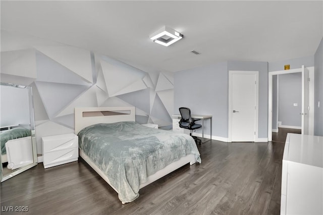 bedroom featuring dark wood-type flooring