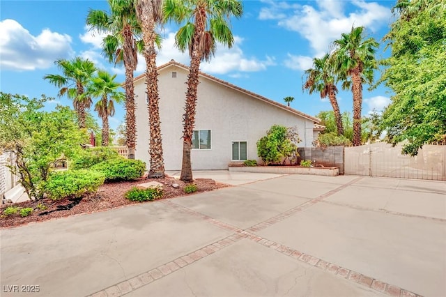 view of home's exterior with a patio area