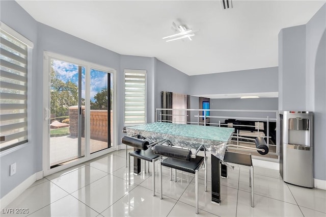 dining space with light tile patterned floors