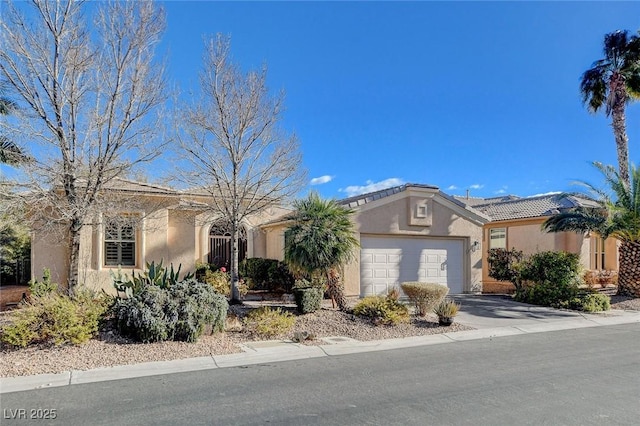 single story home with a garage