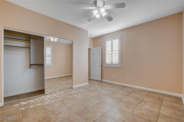 unfurnished bedroom with ceiling fan, light tile patterned flooring, and a closet