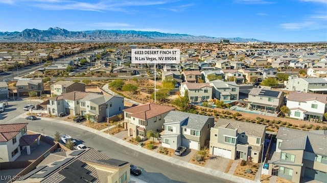 drone / aerial view featuring a mountain view