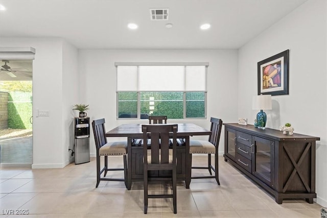 dining room with ceiling fan and light tile patterned flooring