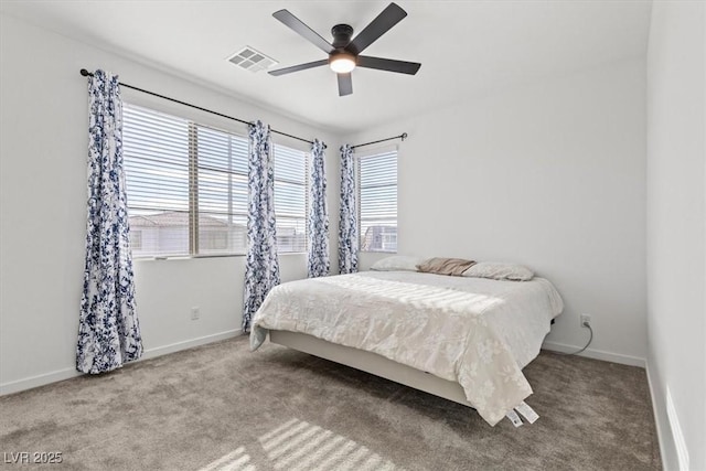 bedroom featuring ceiling fan and carpet floors