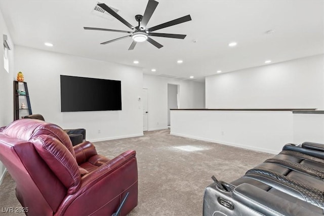 living room featuring ceiling fan and light colored carpet