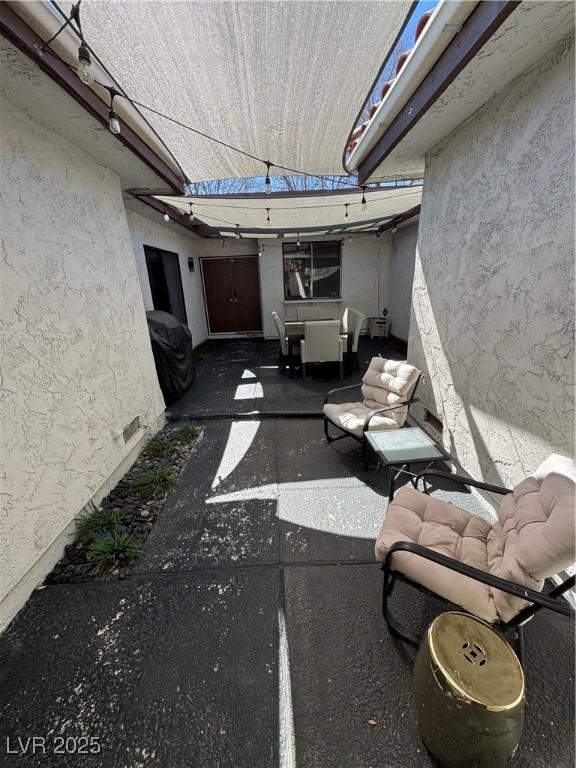 view of patio with a grill