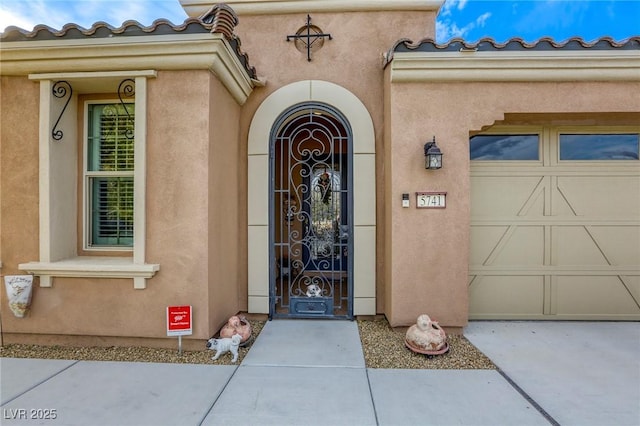 property entrance featuring a garage