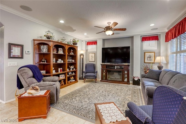 living room featuring light tile patterned floors, ceiling fan, and ornamental molding