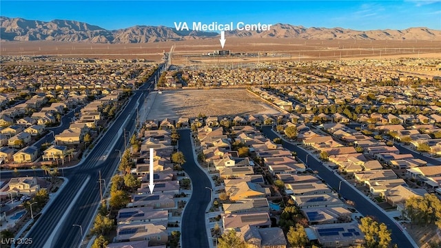 aerial view featuring a mountain view