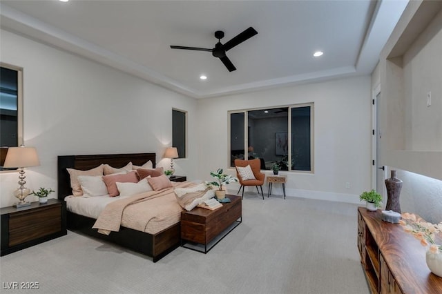 bedroom with ceiling fan and light carpet