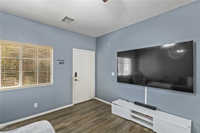 living room with dark wood-type flooring