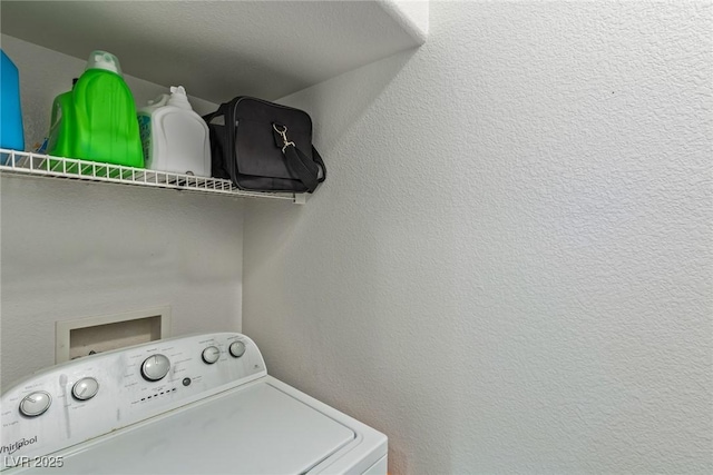 laundry room featuring washer / dryer