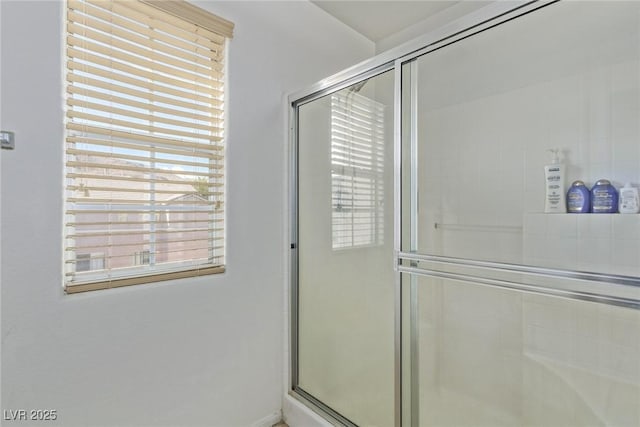 bathroom featuring walk in shower