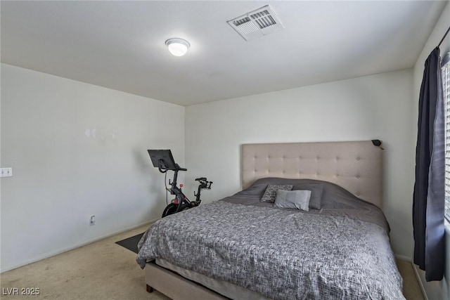 bedroom featuring light colored carpet