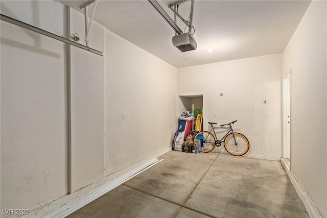 garage featuring a garage door opener