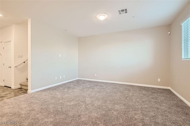 unfurnished room with carpet