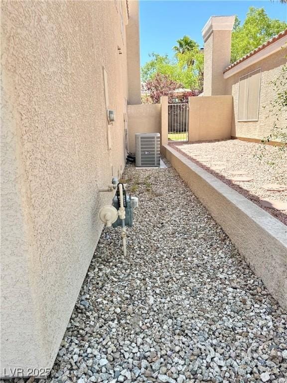 view of side of property featuring cooling unit