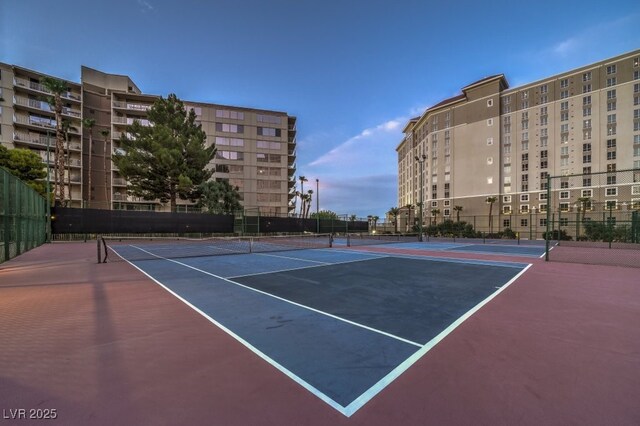 view of sport court with basketball hoop