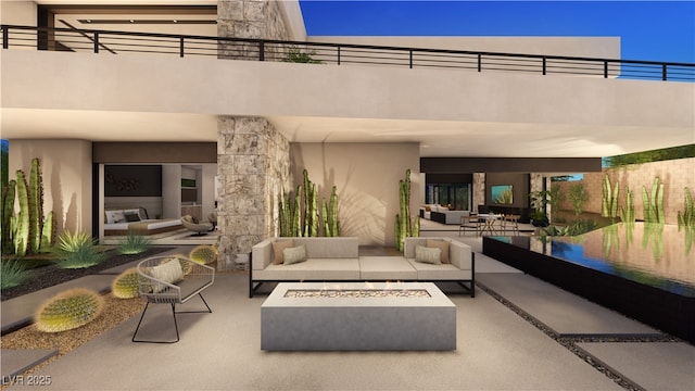 view of patio / terrace featuring an outdoor living space with a fire pit