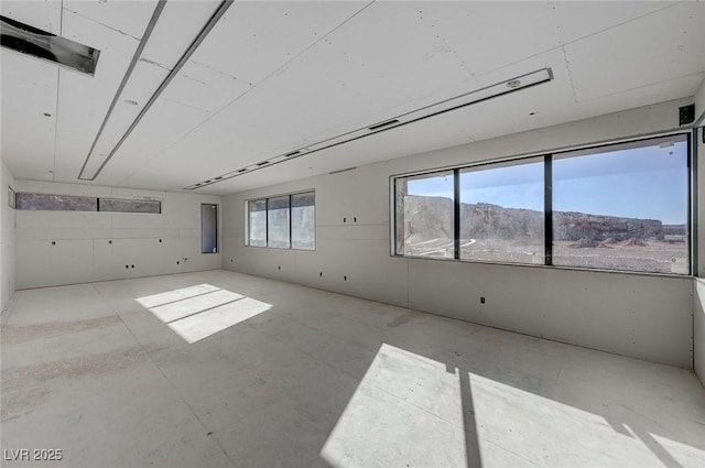 empty room featuring a mountain view