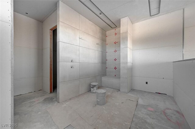 bathroom with concrete floors