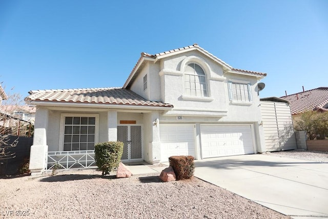 view of front of property with a garage